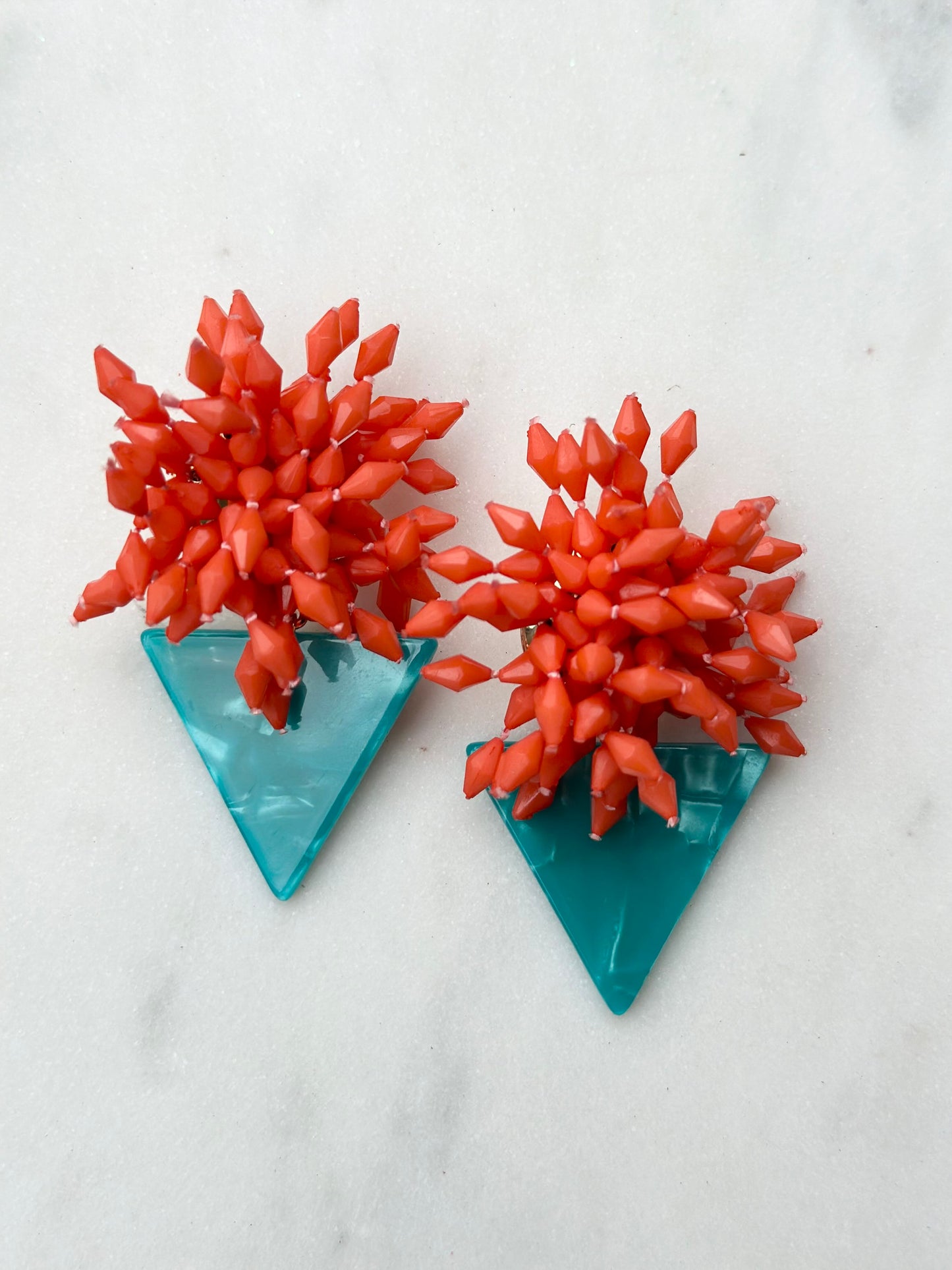pom pom triangle acrylic earrings
