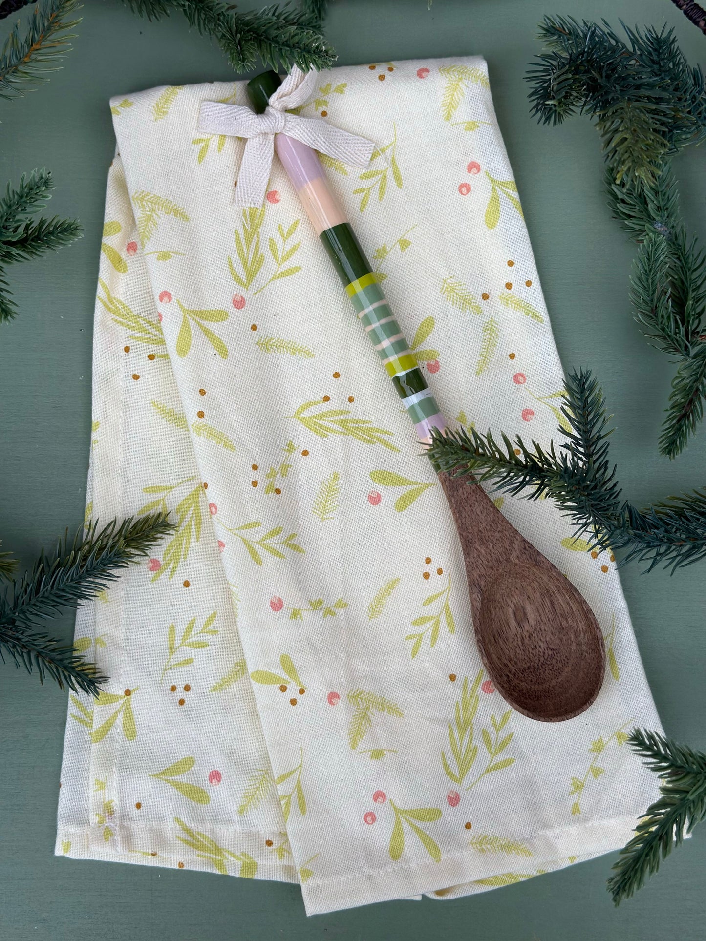 meet me under the mistletoe tea towel with wooden spoon