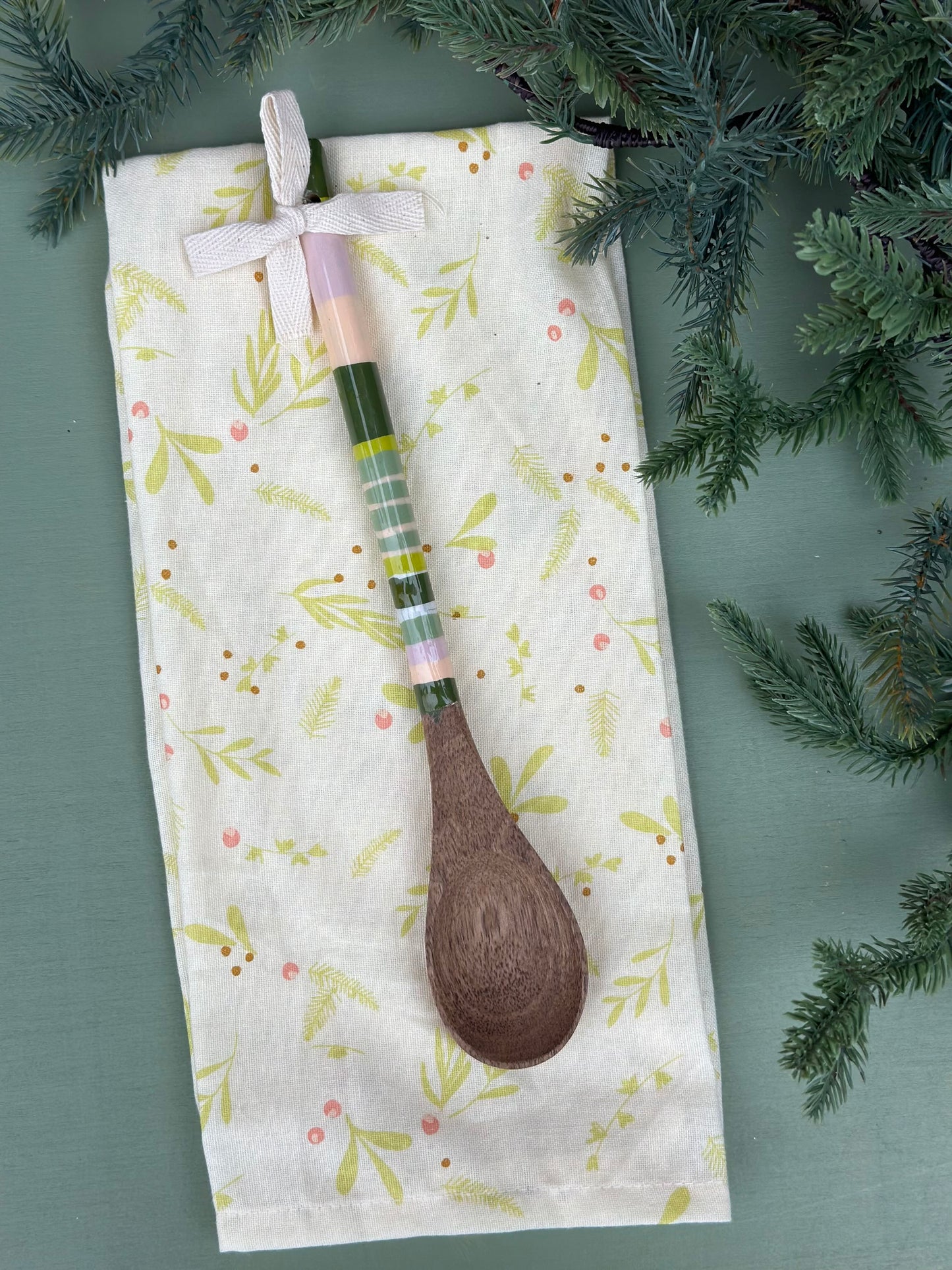 meet me under the mistletoe tea towel with wooden spoon