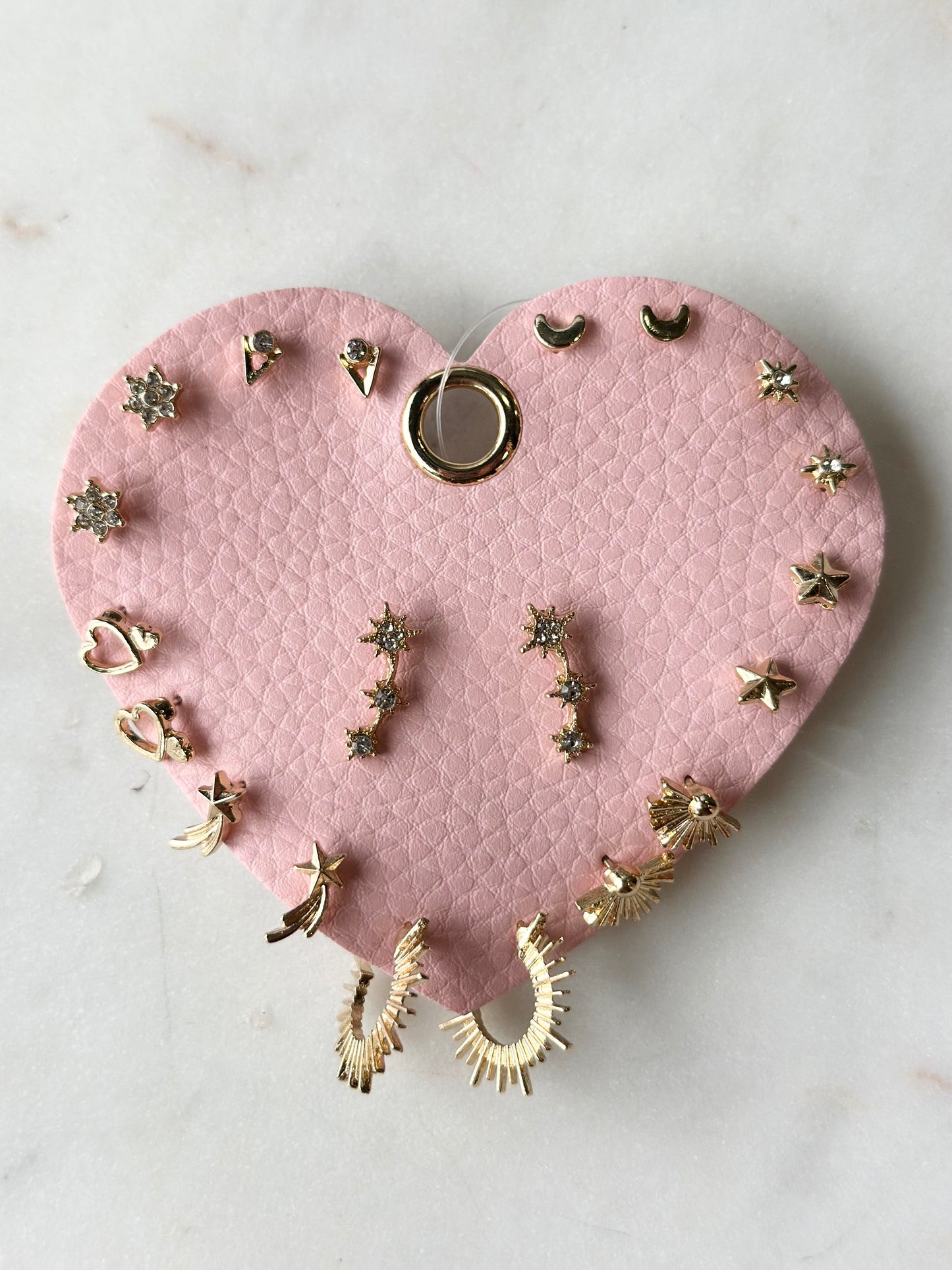 shes with a stud-muffin earrings set