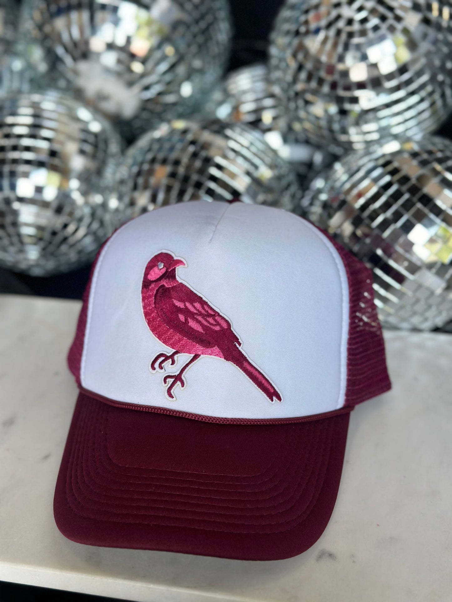 united in cardinal and pink trucker hat