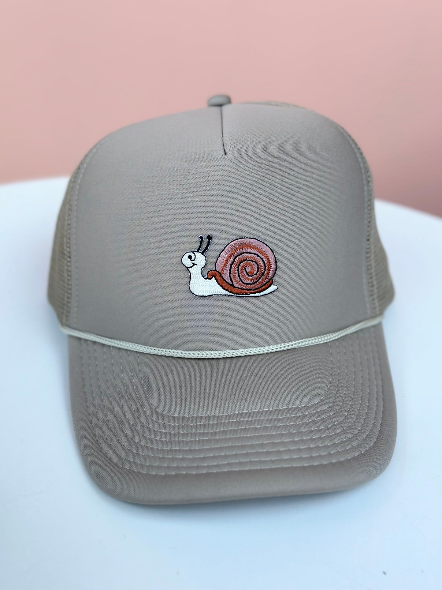 snail trucker hat