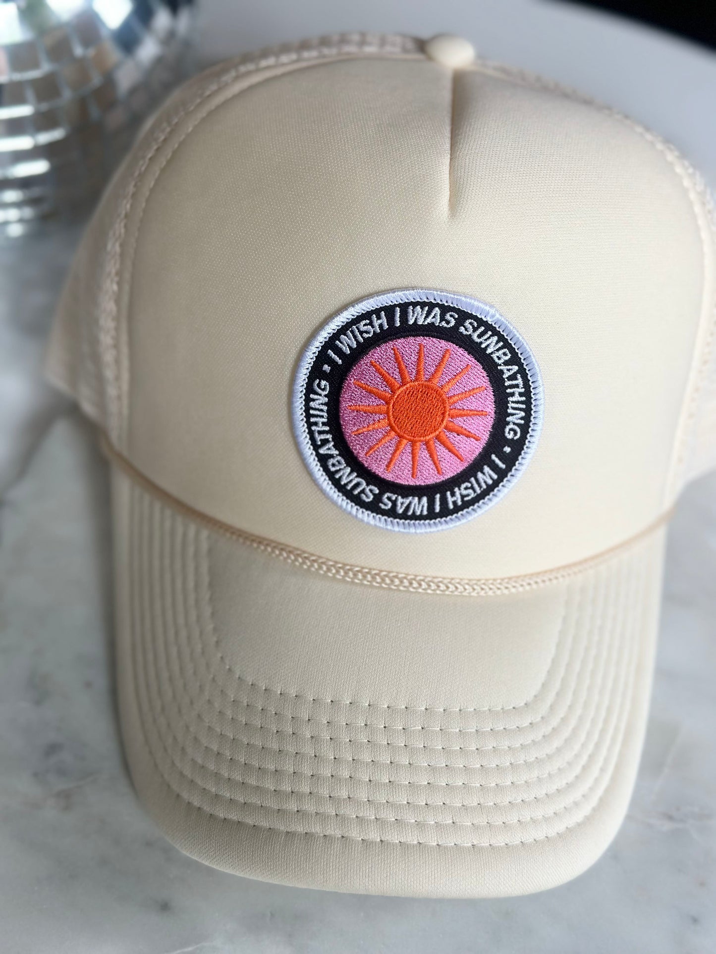 i wish i was sunbathing trucker hat