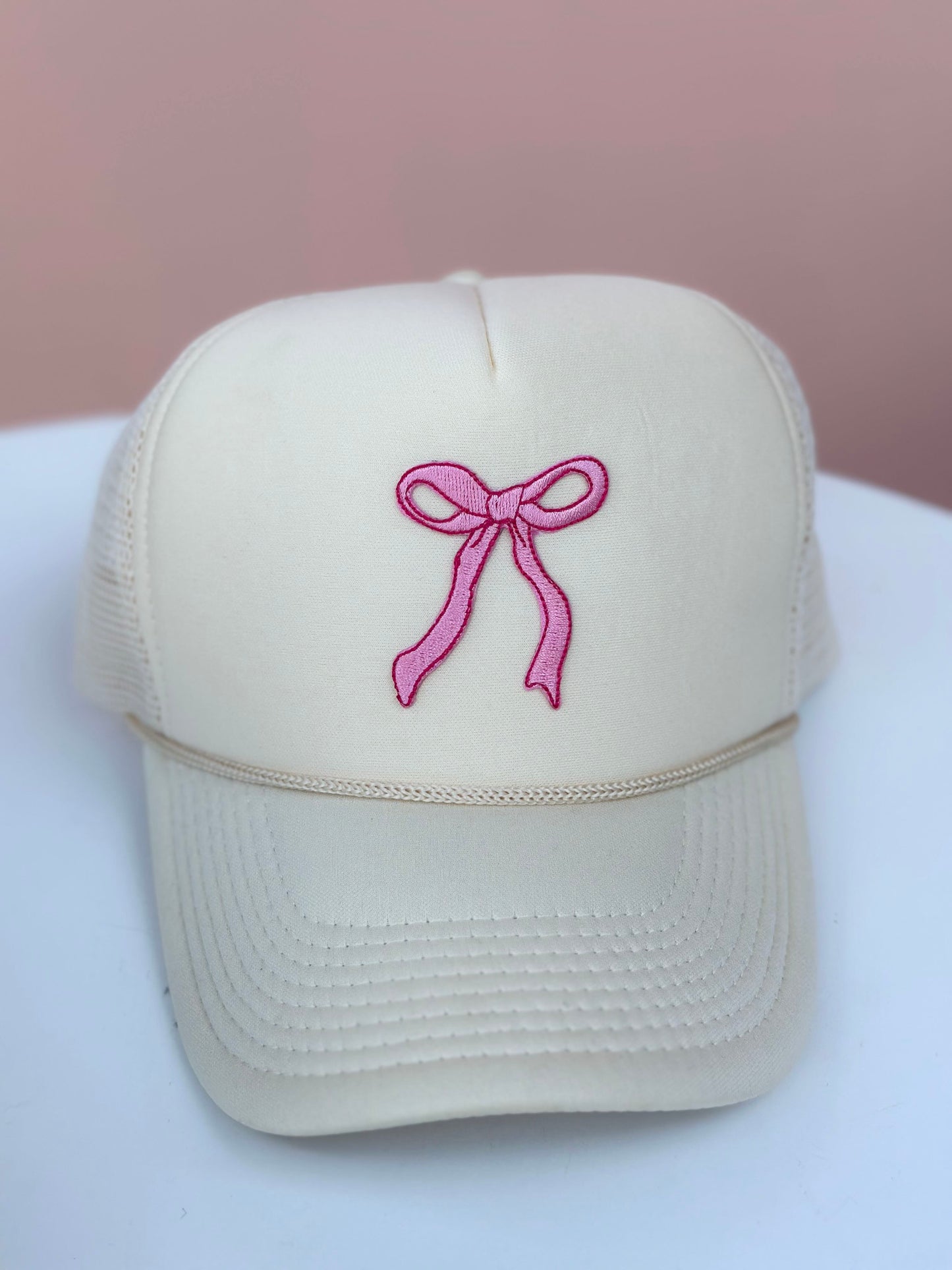 just add a bow to it trucker hat