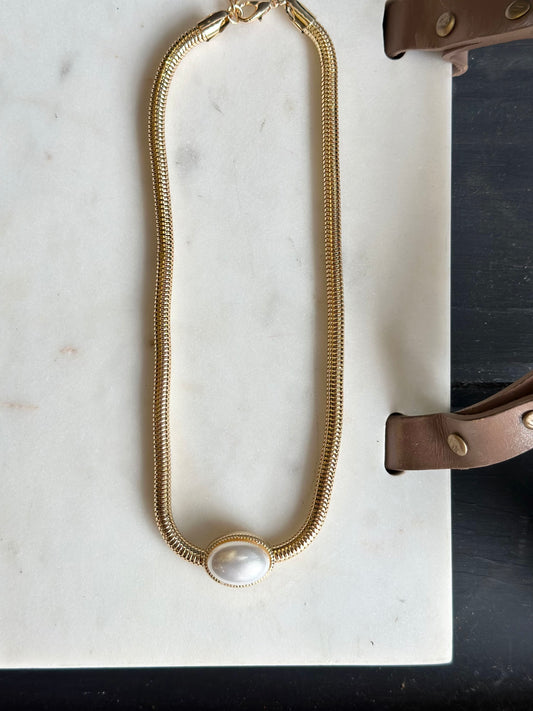 the snake and pearl necklace