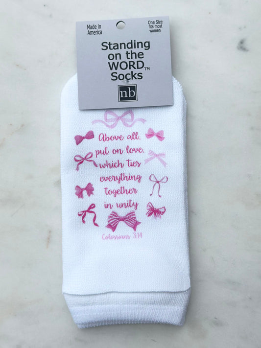 standing on the word socks - above all, put on love