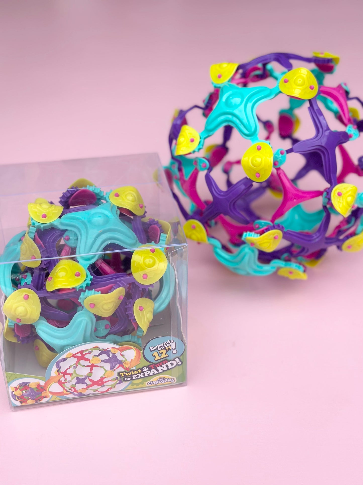 curiosities expand a ball flower - purple