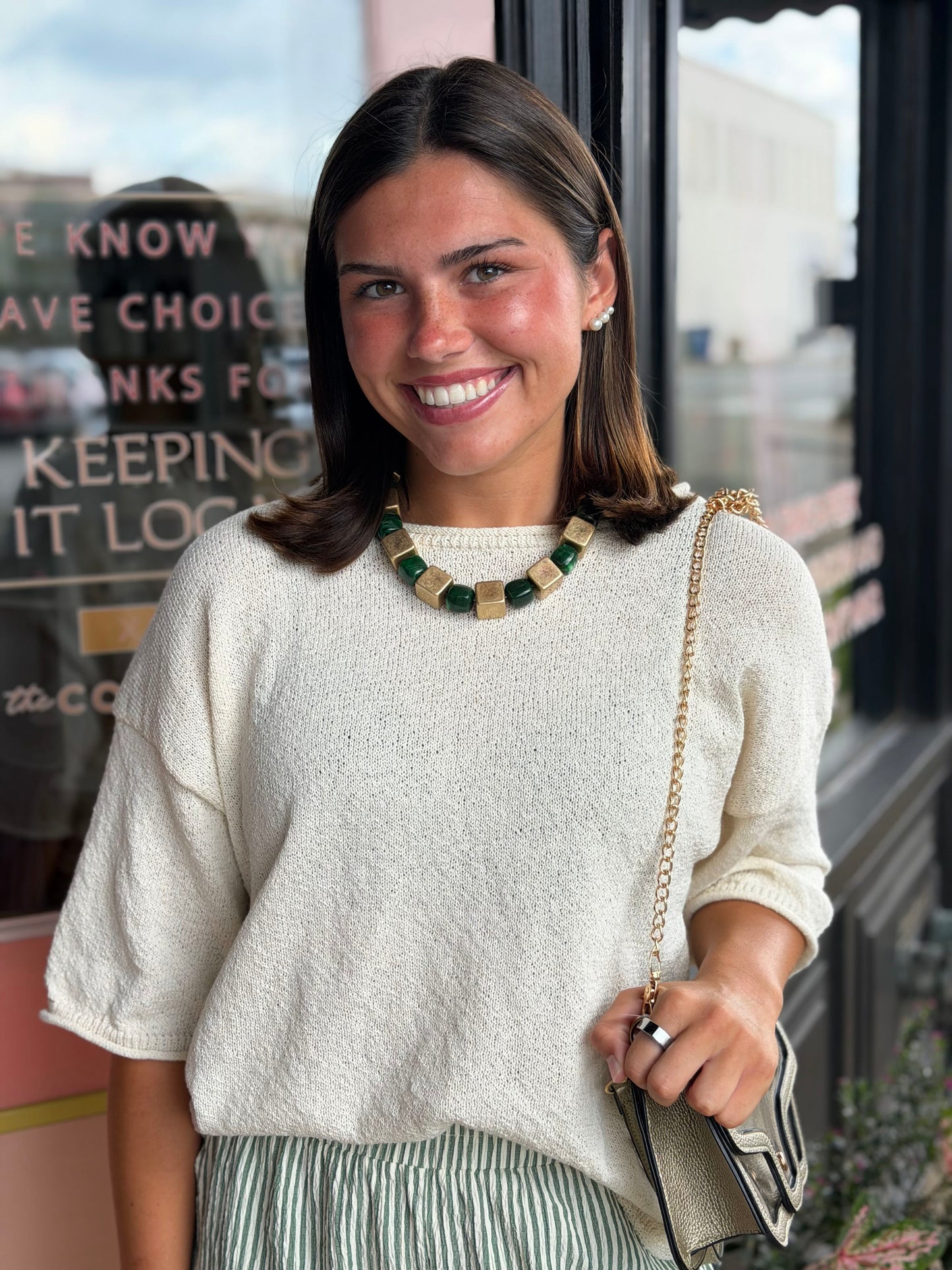 the capsule queen sweater top