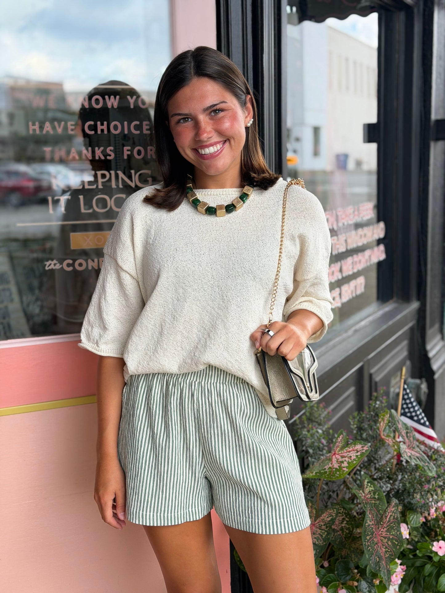 the capsule queen sweater top
